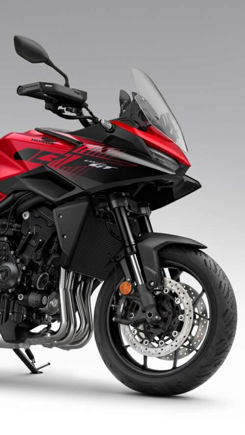A high-resolution, detailed view of the sleek and modern 2026 Honda CB1000GT sports... Apple iPhone SE 2022 free wallpaper
