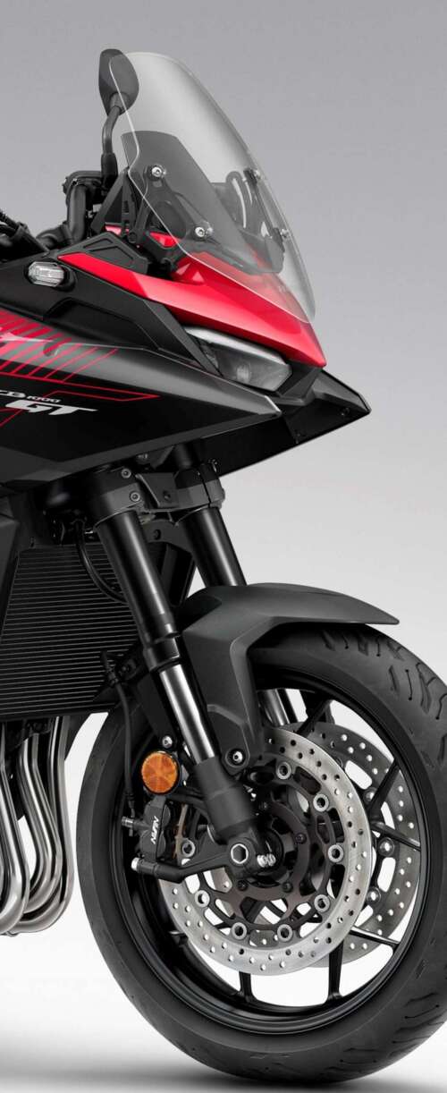 A high-resolution, cinematic view of the futuristic 2026 Honda CB1000GT touring motorcycle. Samsung Galaxy Z Flip7 FE wallpaper photo gallery download