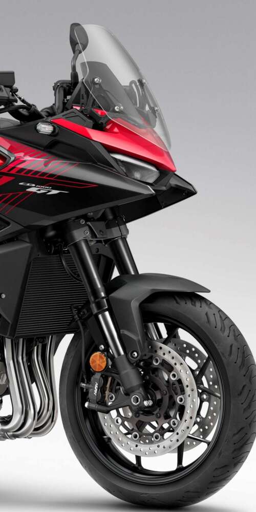 A high-resolution, cinematic view of the futuristic 2026 Honda CB1000GT touring motorcycle. Ulefone Armor X32 Pro 4G pictures for wallpaper