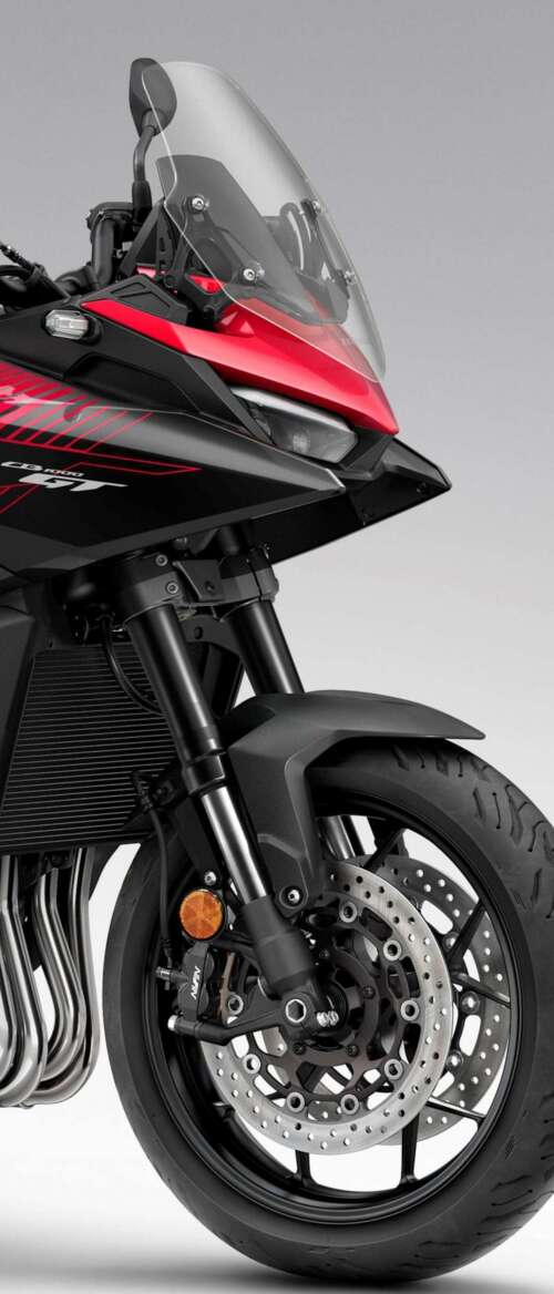 A high-resolution, cinematic view of the futuristic 2026 Honda CB1000GT touring motorcycle. nubia Flip 3