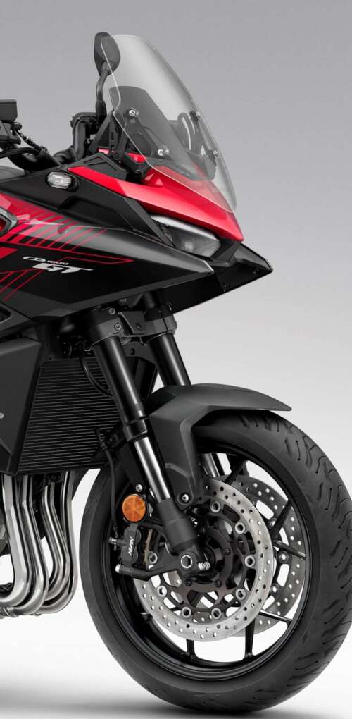A high-resolution, cinematic view of the futuristic 2026 Honda CB1000GT touring motorcycle. Huawei Mate 30 Pro hd background
