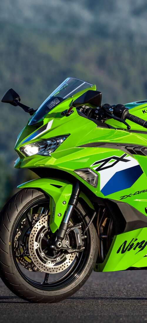 A sleek and futuristic 2026 Kawasaki Ninja ZX-4RR motorcycle featuring signature... Oppo Find X9 download free wallpaper for phone