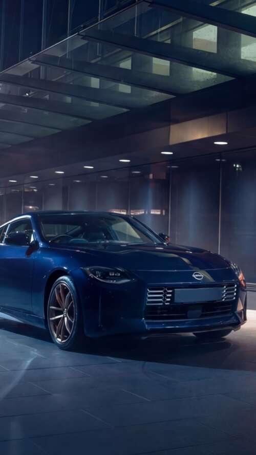A sleek and detailed view of the 2026 Nissan Z Heritage Edition sports car. Apple iPhone SE 2022 wallpaper images