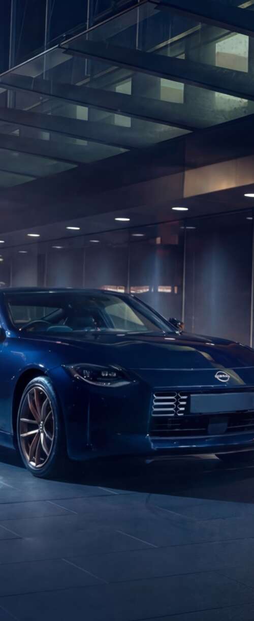 A sleek and detailed view of the 2026 Nissan Z Heritage Edition sports car. Samsung Galaxy Z Flip7 FE free hd wallpapers