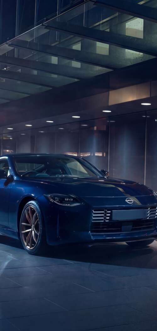 A sleek and detailed view of the 2026 Nissan Z Heritage Edition sports car. Oppo A6k 4G high definition wallpaper