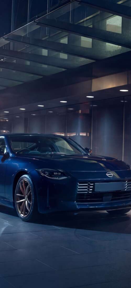 A sleek and detailed view of the 2026 Nissan Z Heritage Edition sports car. Oppo K13 Turbo wallpapers for android
