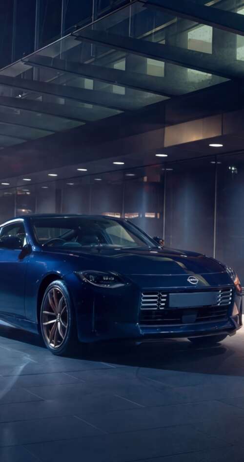 A sleek and detailed view of the 2026 Nissan Z Heritage Edition sports car. Sharp Aquos C10 wallpaper download