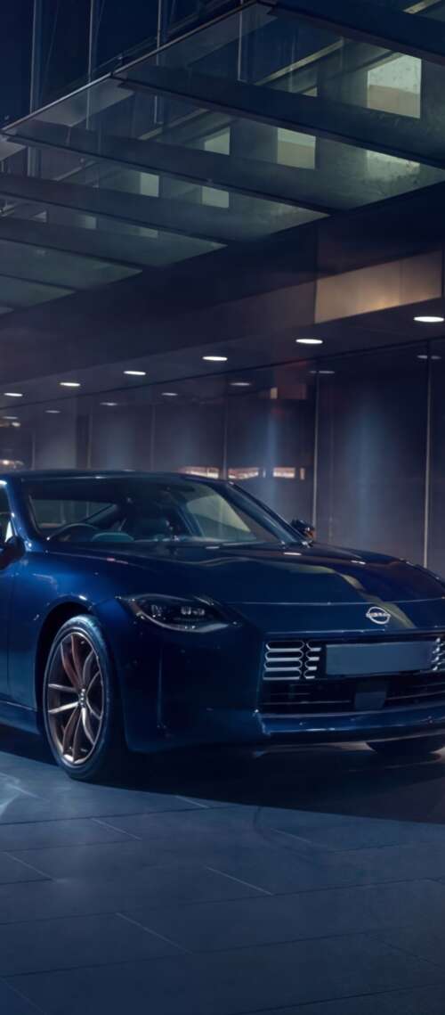 A sleek and detailed view of the 2026 Nissan Z Heritage Edition sports car. Cubot King Kong Power 5 cell phone backgrounds free