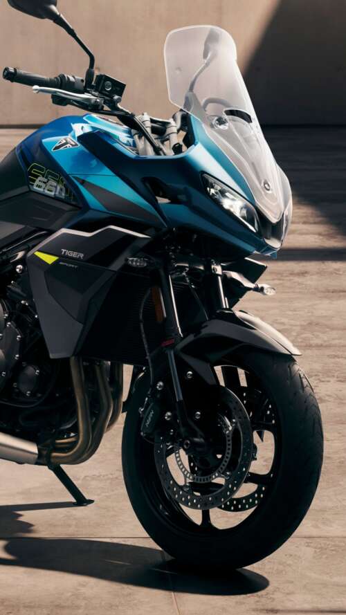 Close-up view of the 2026 Triumph Tiger Sport 660 adventure touring motorcycle hand phone wallpaper