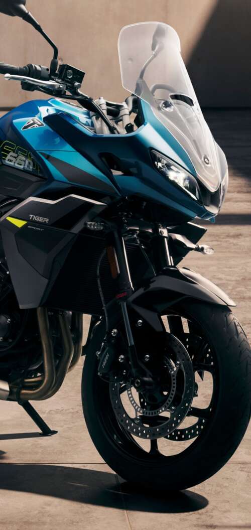 Close-up view of the 2026 Triumph Tiger Sport 660 adventure touring motorcycle Oppo A6k 4G download free wallpaper for phone