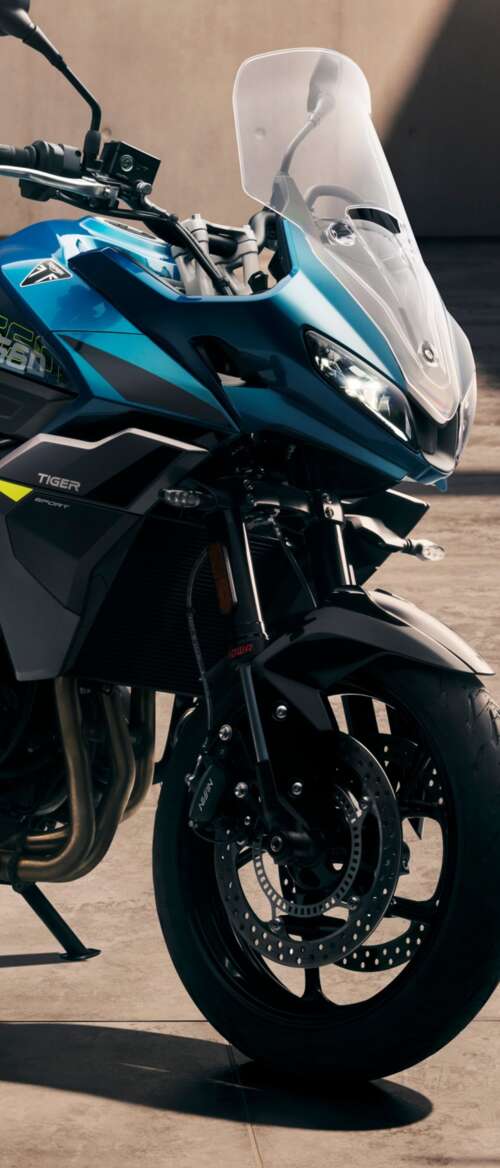 Close-up view of the 2026 Triumph Tiger Sport 660 adventure touring motorcycle nubia Flip 3 background images hd