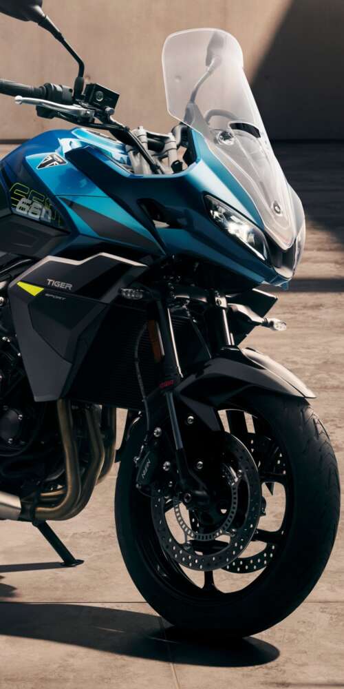 Close-up view of the 2026 Triumph Tiger Sport 660 adventure touring motorcycle Ulefone Armor X32 Pro 4G lock screen wallpaper