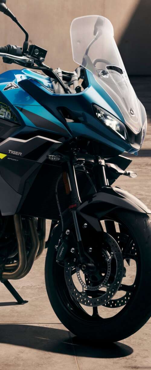Close-up view of the 2026 Triumph Tiger Sport 660 adventure touring motorcycle Samsung Galaxy Z Flip7 FE cell phone backgrounds free