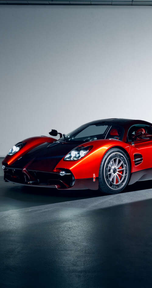 A high-performance red Pagani Utopia hypercar featuring sleek aerodynamic lines and... Sharp Aquos C10 cell phone backgrounds free