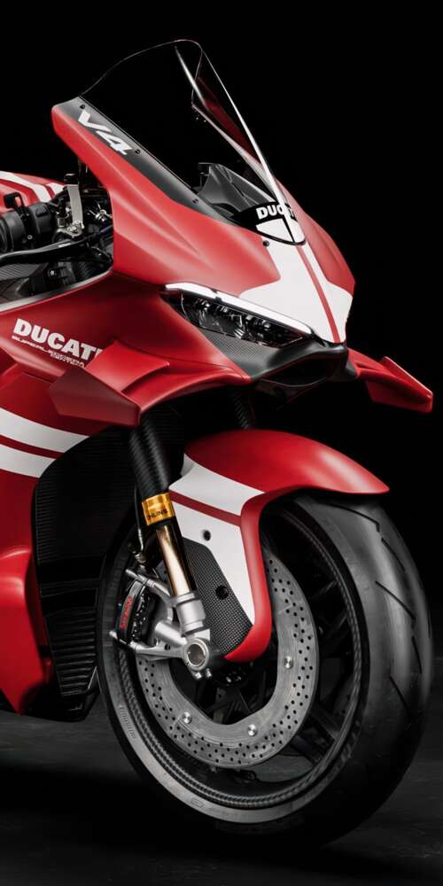 A cinematic close-up of a Ducati Superleggera V4 Centenario sports motorcycle against... Ulefone Rugking 2 Pro hd background