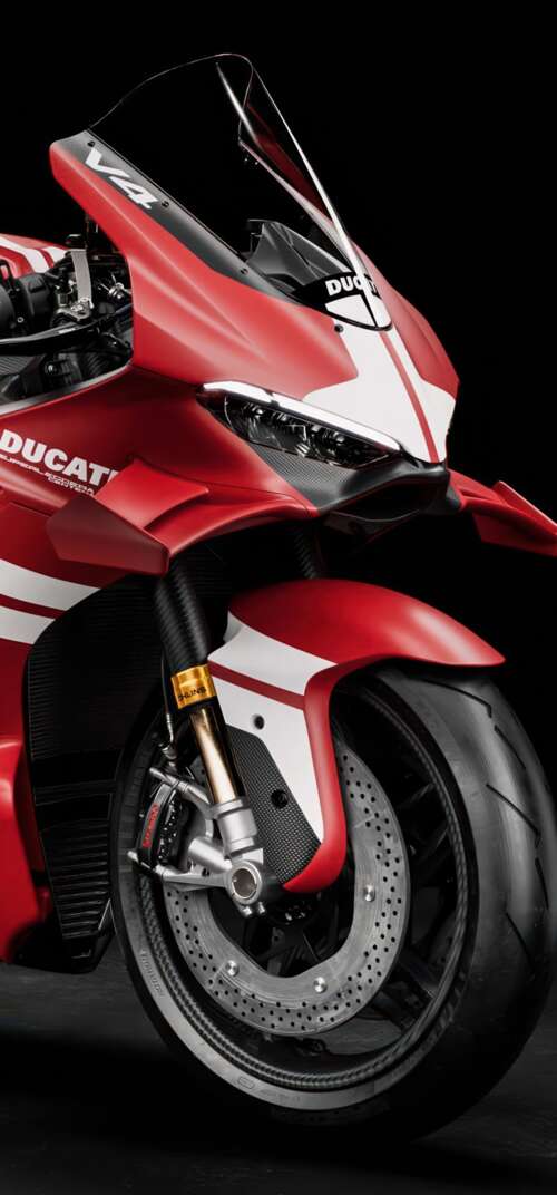 A cinematic close-up of a Ducati Superleggera V4 Centenario sports motorcycle against... Samsung Galaxy S26 Ultra pictures for wallpaper