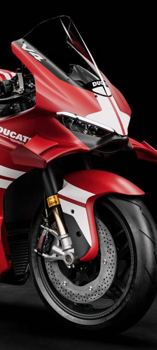 A cinematic close-up of a Ducati Superleggera V4 Centenario sports motorcycle against... itel CITY 100 mobile wallpaper