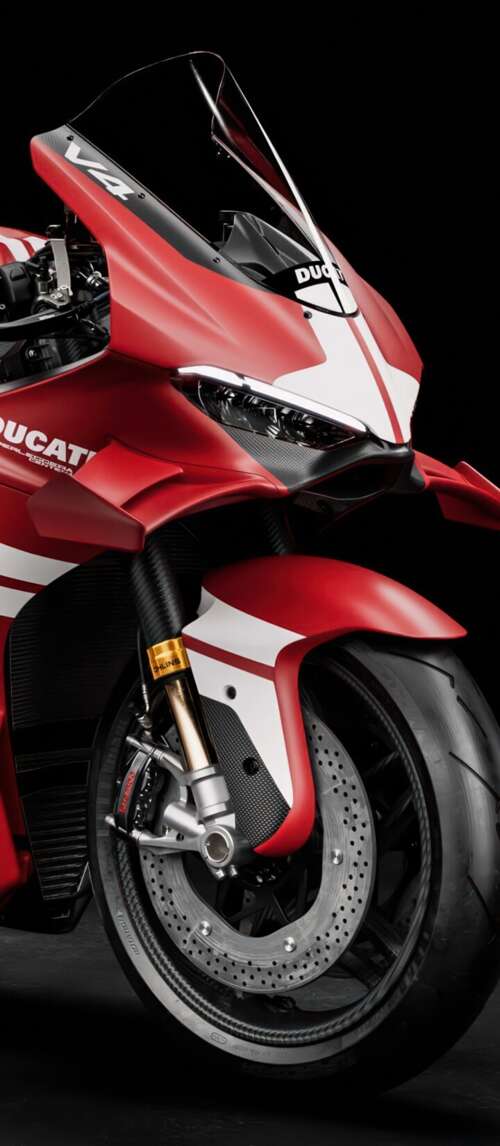 A cinematic close-up of a Ducati Superleggera V4 Centenario sports motorcycle against... Xiaomi Redmi 14C 5G high definition wallpaper
