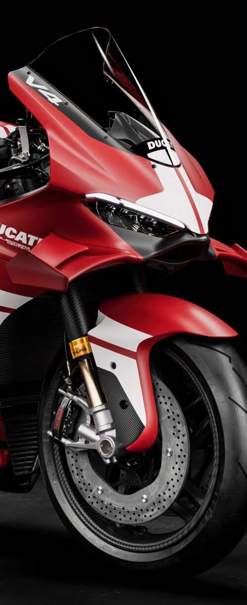 A cinematic close-up of a Ducati Superleggera V4 Centenario sports motorcycle against... Samsung Galaxy Z Flip7 FE download free phone wallpaper