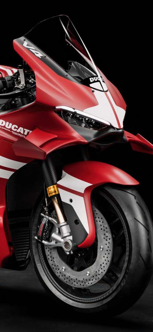 A cinematic close-up of a Ducati Superleggera V4 Centenario sports motorcycle against... Xiaomi Redmi 15 4G wallpaper images