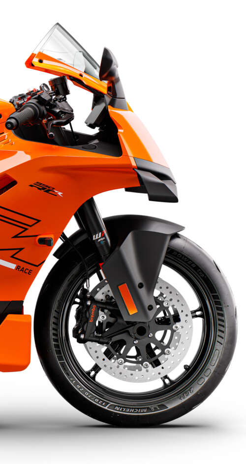 A highly aerodynamic futuristic sports motorcycle with sleek metallic plating and... Sharp Aquos C10 high definition wallpaper