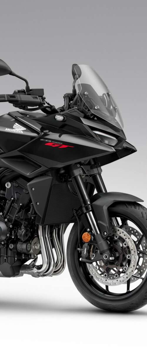 A sleek and modern black 2026 Honda CB1000GT touring motorcycle with a glossy finish. Samsung Galaxy Z Flip7 FE wallpapers for android