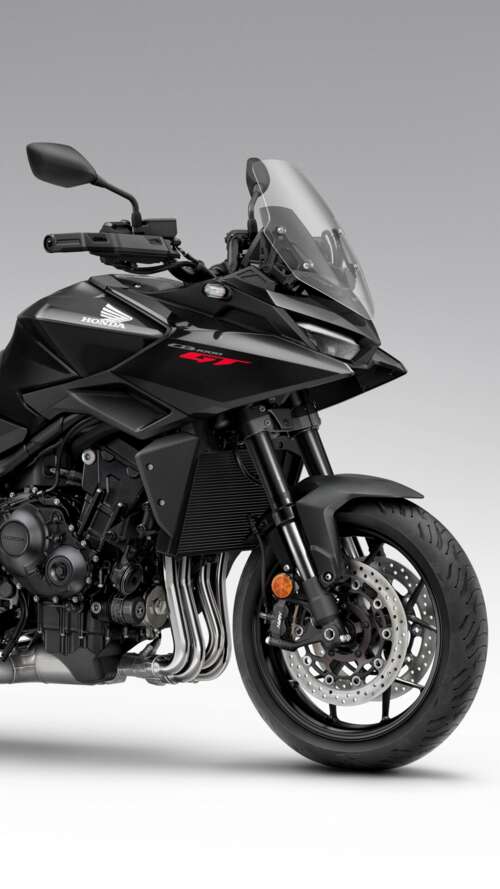A sleek and modern black 2026 Honda CB1000GT touring motorcycle with a glossy finish. Apple iPhone SE 2022 wallpaper