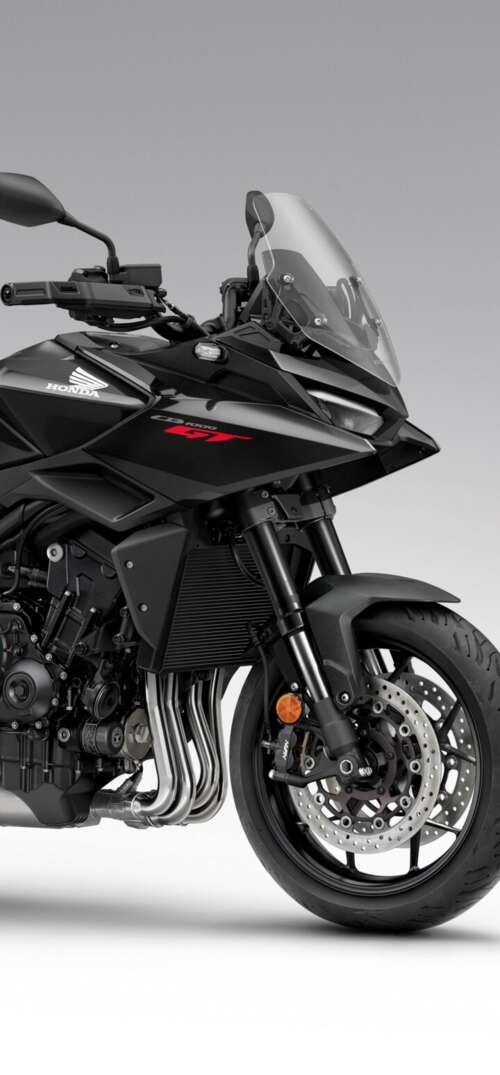 A sleek and modern black 2026 Honda CB1000GT touring motorcycle with a glossy finish. UmiDigi Umidigi X lock screen wallpaper