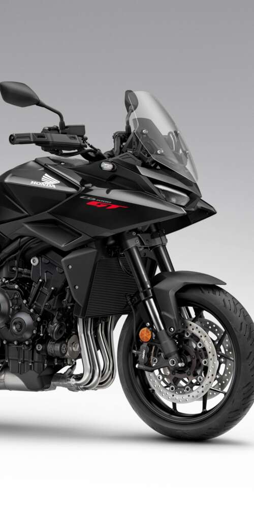A sleek and modern black 2026 Honda CB1000GT touring motorcycle with a glossy finish. Ulefone Rugking 2 Pro download free phone wallpaper