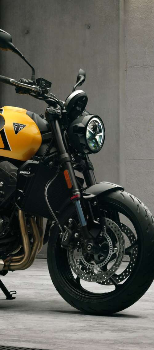 High-detail 5K render of the 2026 Triumph Trident 660 naked motorcycle featuring... hotwav X100 GT wallpapers for android