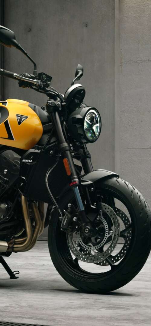 High-detail 5K render of the 2026 Triumph Trident 660 naked motorcycle featuring... UmiDigi Umidigi X wallpaper