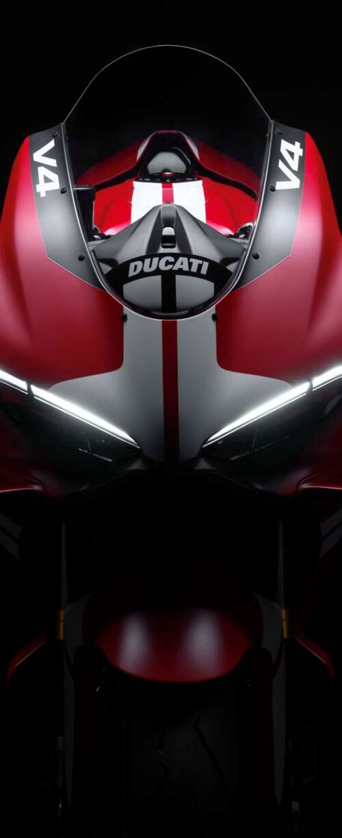 Cinematic close-up of a Ducati Superleggera V4 Centenario sports bike in a dark studio... Samsung Galaxy Z Flip7 FE wallpaper photo gallery download