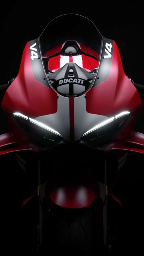 Cinematic close-up of a Ducati Superleggera V4 Centenario sports bike in a dark studio... Apple iPhone SE 2022 wallpapers for android