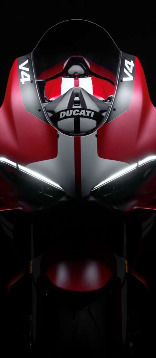Cinematic close-up of a Ducati Superleggera V4 Centenario sports bike in a dark studio... Xiaomi Redmi 14C 5G wallpaper download