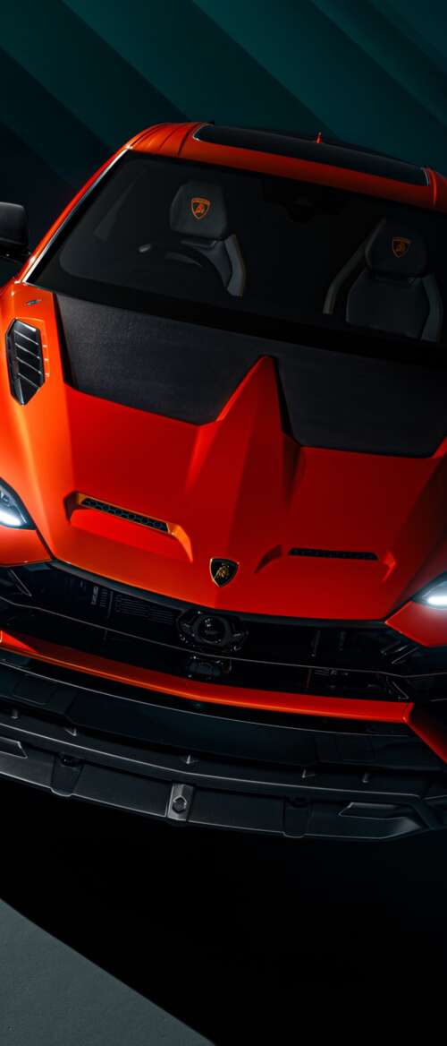 A sleek, dark luxury sports car parked on a city street at night with subtle reflections... nubia Flip 3 download free wallpaper for phone