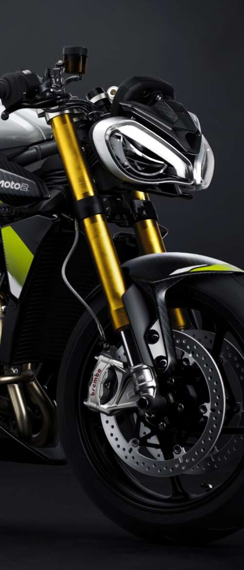 Triumph Street Triple 765 Moto2 Edition motorcycle against a moody dark background nubia Flip 3 free background
