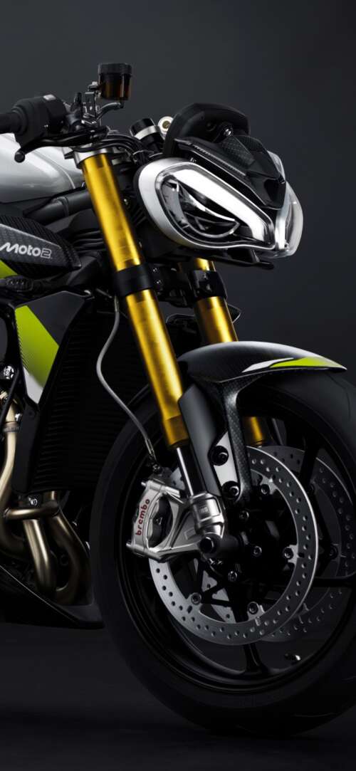 Triumph Street Triple 765 Moto2 Edition motorcycle against a moody dark background Xiaomi Redmi 15 4G download free phone wallpaper