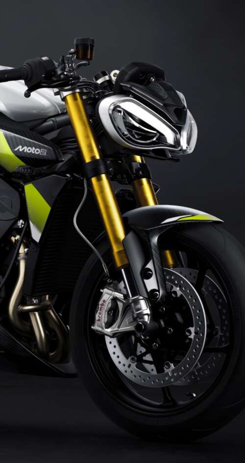 Triumph Street Triple 765 Moto2 Edition motorcycle against a moody dark background Sharp Aquos C10 wallpapers for android