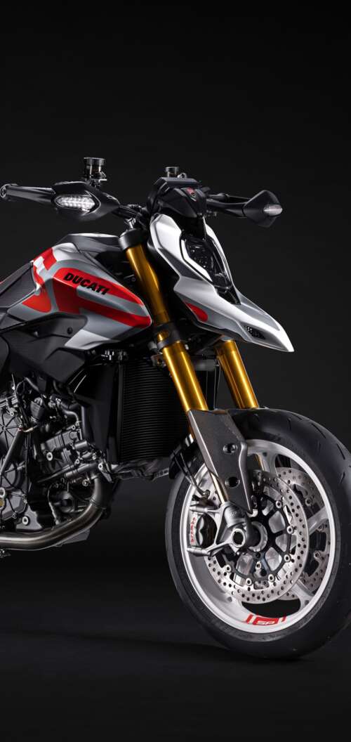 A high-detail 5K cinematic shot of the 2026 Ducati Hypermotard V2 motorcycle featuring... download free wallpaper for phone