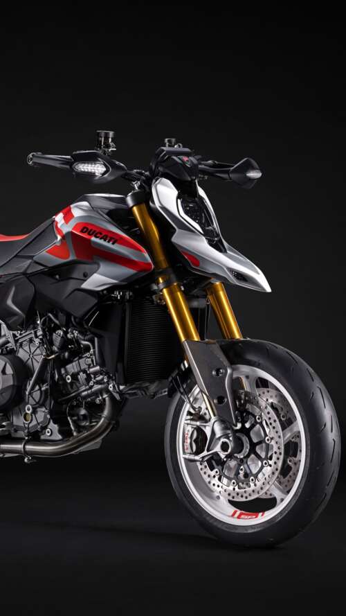 A high-detail 5K cinematic shot of the 2026 Ducati Hypermotard V2 motorcycle featuring... Apple iPhone SE 2022 high definition wallpaper