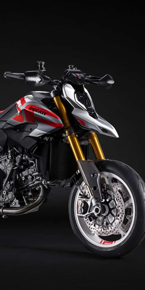 A high-detail 5K cinematic shot of the 2026 Ducati Hypermotard V2 motorcycle featuring... Ulefone Rugking 2 Pro hand phone wallpaper
