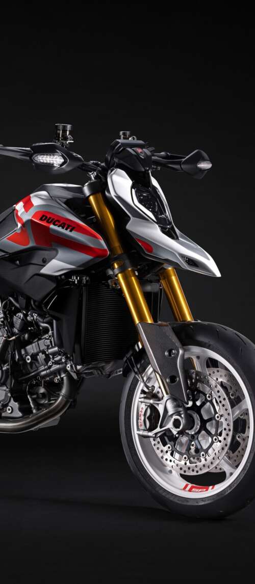 A high-detail 5K cinematic shot of the 2026 Ducati Hypermotard V2 motorcycle featuring... Xiaomi Redmi 14C 5G free background images