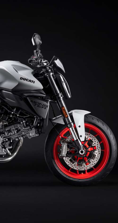 A high-resolution, cinematic close-up of a 2026 Ducati Monster V2 motorcycle set... Sharp Aquos C10 wallpapers for android