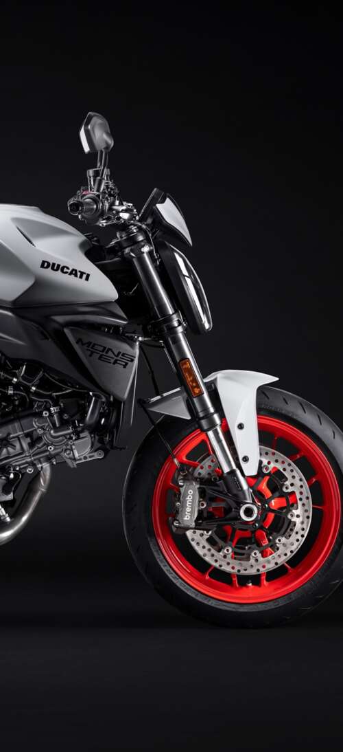 A high-resolution, cinematic close-up of a 2026 Ducati Monster V2 motorcycle set... realme GT 7T wallpaper images
