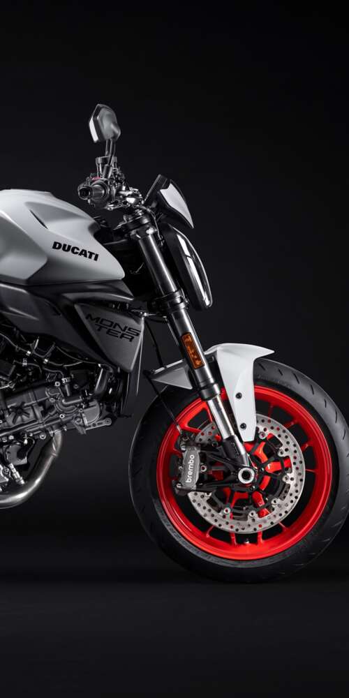 A high-resolution, cinematic close-up of a 2026 Ducati Monster V2 motorcycle set... Ulefone Rugking 2 Pro mobile wallpaper