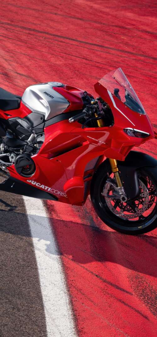 A high-resolution, detailed view of a red Ducati Panigale V4 R sports motorcycle. wallpapers for android