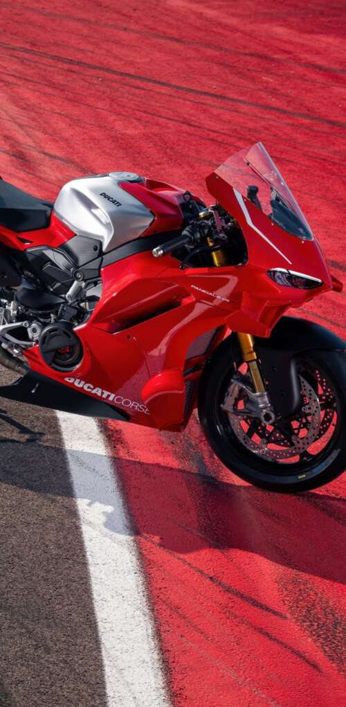 A high-resolution, detailed view of a red Ducati Panigale V4 R sports motorcycle. Huawei Mate 30 Pro wallpapers for android