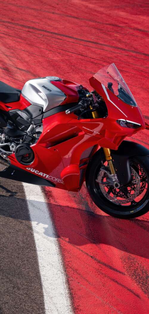 A high-resolution, detailed view of a red Ducati Panigale V4 R sports motorcycle. Oppo A6k 4G cell phone backgrounds free