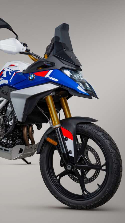 High-resolution display of advanced adventure motorcycles at the EICMA 2026 exhibition. Apple iPhone SE 2022 high definition wallpaper
