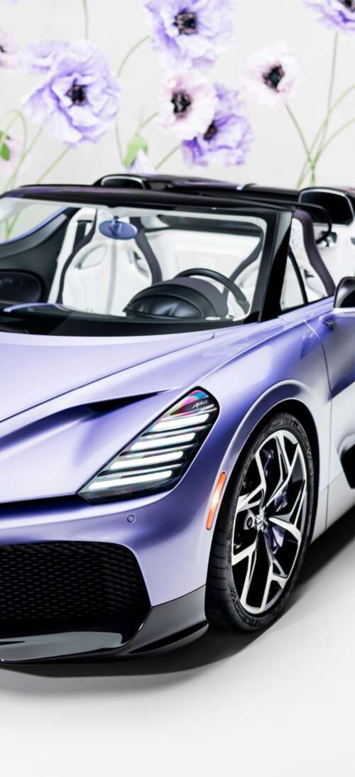 A sleek, futuristic one-off roadster car with a deep purple aesthetic and aerodynamic... realme GT 7T download free phone wallpaper